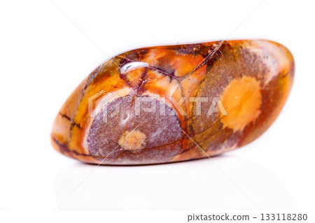 Macro mineral stone jasper "bird's eye" on white background 133118280