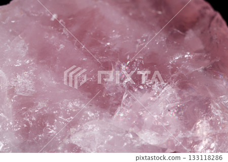 Macro mineral stone Pink quartz on black background Macro mineral stone Pink quartz on black background 133118286
