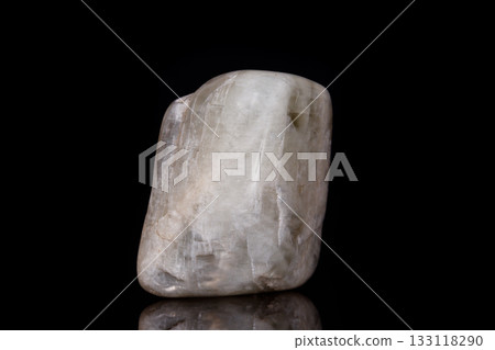 Macro mineral stone Moonstone on black background 133118290