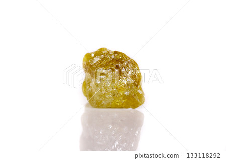 Macro mineral stone Green pomegranate on white background 133118292