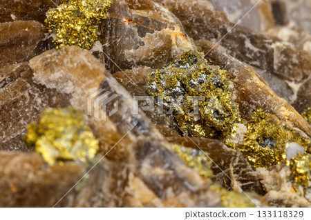 Macro mineral stone Barit Pyrit on a white background Macro mineral stone Barit Pyrit on a white background 133118329