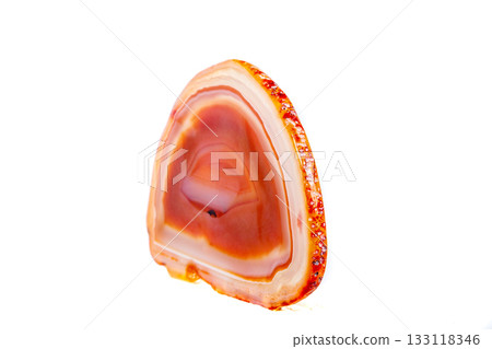 Macro mineral orange agate in crystals on white background 133118346