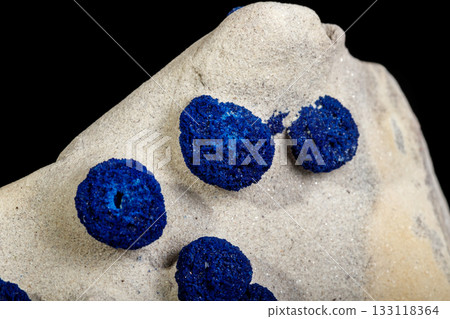 Macro mineral stone Azurite in siltstone against black background Macro mineral stone Azurite in siltstone against black background 133118364
