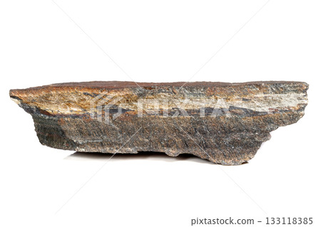Macro mineral stone Snake eye in the rock a white background Macro mineral stone Snake eye in the rock a white background 133118385
