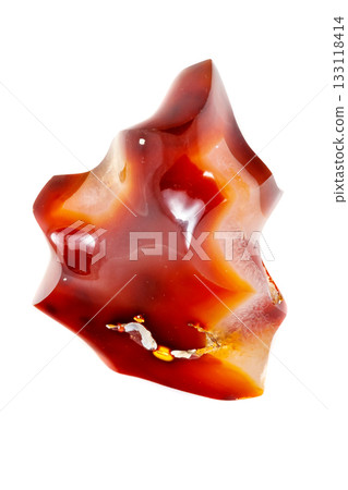 Macro mineral stone Cornelian on a white background Macro mineral stone Cornelian on a white background 133118414
