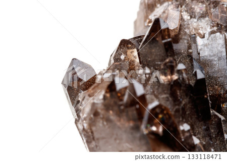 Macro mineral stone Morion crystal in the rock a white background Macro mineral stone Morion crystal in the rock a white background 133118471