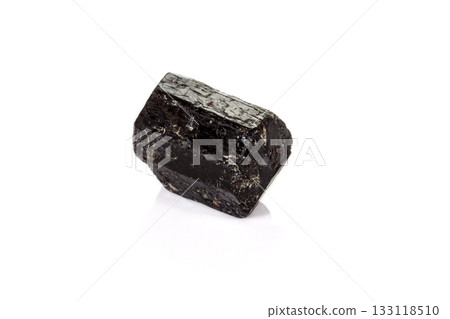 macro mineral stone schorl, black tourmaline on white background macro mineral stone schorl, black tourmaline on white background 133118510
