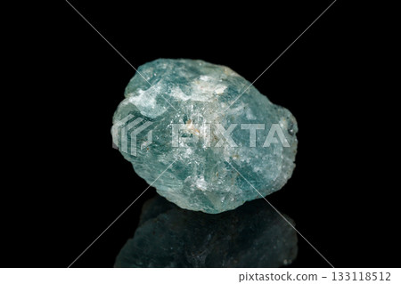 macro mineral stone aquamarine on a black background macro mineral stone aquamarine on a black background 133118512