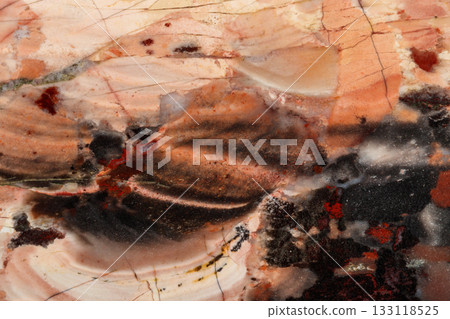 macro stone mineral jasper on black background macro stone mineral jasper on black background 133118525