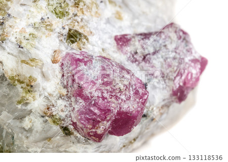 Macro mineral stone Ruby in rock on white background Macro mineral stone Ruby in rock on white background 133118536