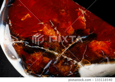 Macro mineral stone Cornelian on a black background Macro mineral stone Cornelian on a black background 133118540