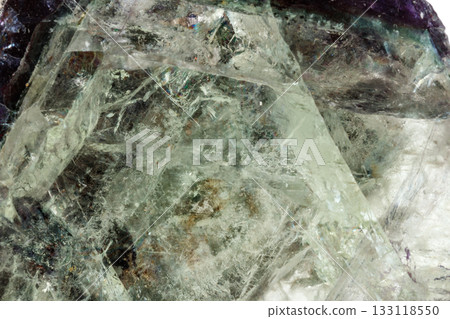 Macro of a mineral stone Fluorite on a white background Macro of a mineral stone Fluorite on a white background 133118550