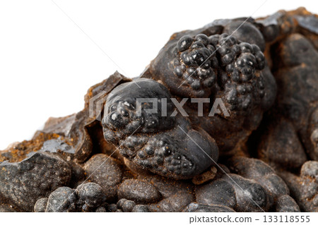 Macro mineral Hematite stone on a white background close-up 133118555