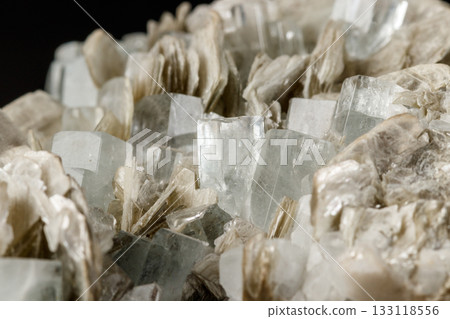 Macro mineral stone Aquamarine in rock on a black background 133118556