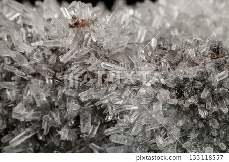 Macro mineral stone sulfite quartz on a black background 133118557