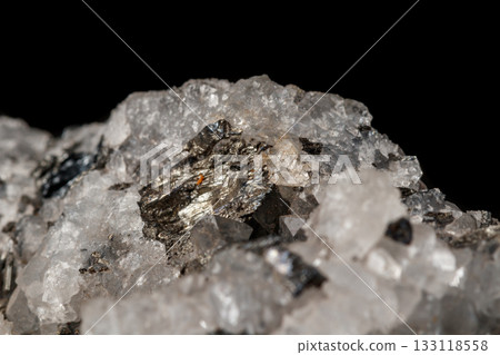 Macro mineral stone Stibnite quartz on a black background Macro mineral stone Stibnite quartz on a black background 133118558