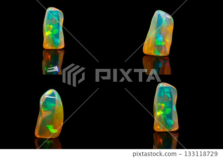 macro mineral stone rare and beautiful opals on a black background macro mineral stone rare and beautiful opals on a black background 133118729