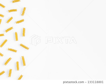 Pasta products in the form of a spiral, texture, on a white background Pasta products in the form of a spiral, texture, on a white background 133118801