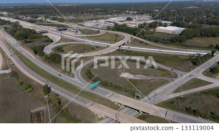 Vehicles are moving along the complex highway interchange Vehicles are moving along the complex highway interchange 133119004