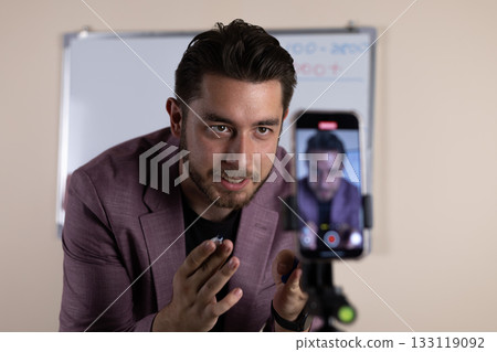 The journalist interviews a public figure to gather information for a story 133119092