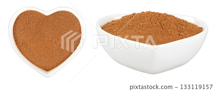 Cinnamon powder in ceramic bowl isolated on white background. Top view. Flat lay. Cinnamon powder in ceramic bowl isolated on white background. Top view. Flat lay. 133119157