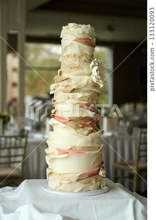 wedding cake on the table ballroom background wedding cake on the table ballroom background 133120093