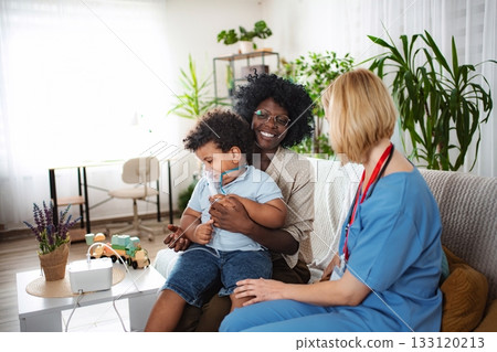 Caring doctor listening to family concerns 133120213