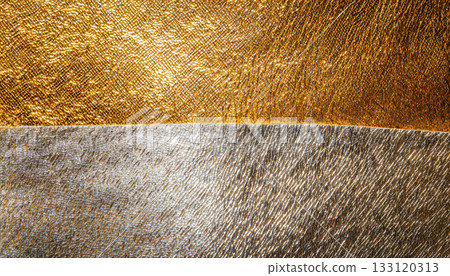 Abstract composition of intersecting gold and silver textures / Background material that creates a sense of luxury and brilliance 133120313