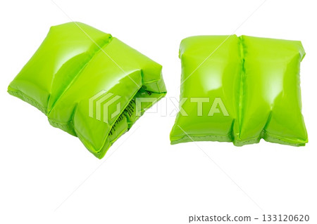 Bright green inflatable swim arm bands for child safety in water Bright green inflatable swim arm bands for child safety in water 133120620