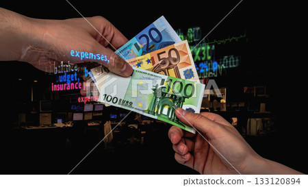 Hands exchanging euro banknotes amidst digital financial data. Hands are shown exchanging euro banknotes, including denominations of 100, 50, and 20 euros. Hands exchanging euro banknotes amidst digital financial data. Hands are shown exchanging euro banknotes, including denominations of 100, 50, and 20 euros. 133120894