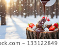 A cake placed on a tree stump and drizzled with chocolate A cake placed on a tree stump and drizzled with chocolate 133122849