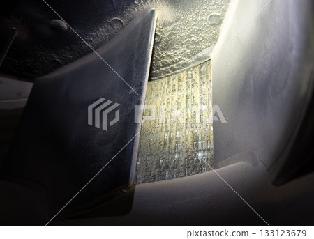 Dirt, mold, and dust inside commercial air conditioners 133123679