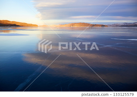 Endless expanses of transparent ice on the frozen Lake Baikal.  133125579