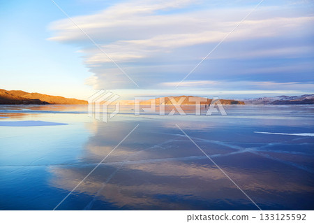 Vast expanses of transparent ice on the frozen Lake Baikal.  133125592