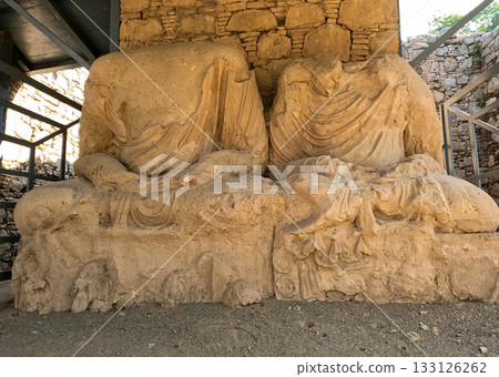 Heritage Headless devotional sculptures showing meditation pose Mohra Muradu Buddhist ruins Taxila Pakistan 133126262