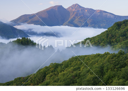 A mountain floating in the sea of clouds 133126696