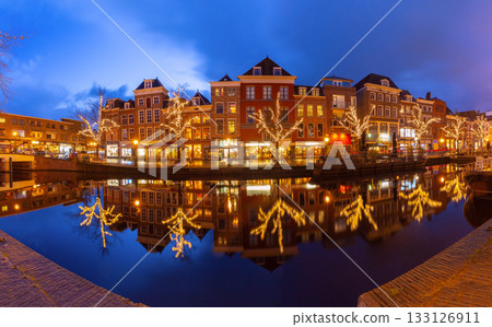 Christmas lights on canal street in Leiden Netherlands at sunset 133126911
