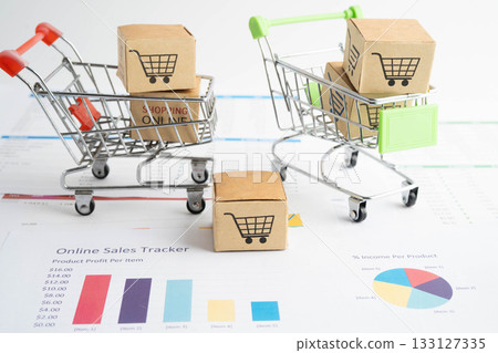Online shopping, Shopping cart box on business graph, import export, finance commerce. Online shopping, Shopping cart box on business graph, import export, finance commerce. 133127335