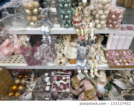 Christmas Ornaments and Dolls on Store Shelves 133127452