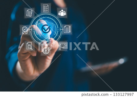 Businesswoman presents project management concept focused on quality assurance and control, featuring ISO standard guarantee marked by tick sign of approval to ensure everything is correct, certified. 133127997