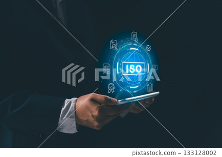 Businesswoman interact global interface display document icon, concept of ISO certification quality management, standard compliance, auditing, enterprise quality policies assurance across business. Businesswoman interact global interface display document icon, concept of ISO certification quality management, standard compliance, auditing, enterprise quality policies assurance across business. 133128002
