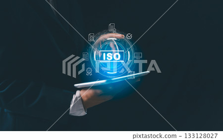 Businesswoman interact global interface display document icon, concept of ISO certification quality management, standard compliance, auditing, enterprise quality policies assurance across business. 133128027