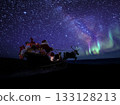 Santa riding a sleigh while watching the beautiful aurora 133128213