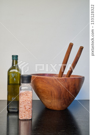 Wooden salad bowl, olive oil, salt Wooden salad bowl, olive oil, salt 133128322