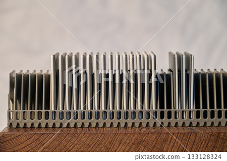 Slide rack for projection against White wall background 133128324