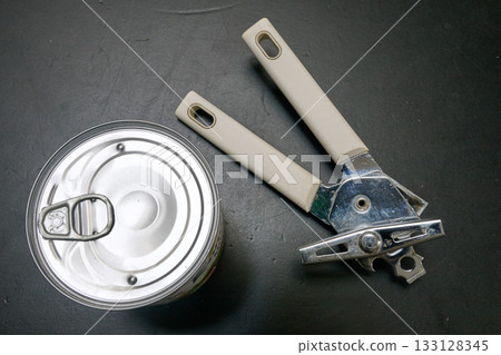 Closed metallic can and opener Closed metallic can and opener 133128345