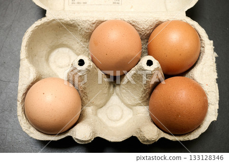 Carton Package of brown eggs Carton Package of brown eggs 133128346