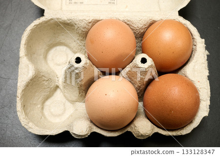 Carton Package of brown eggs 133128347