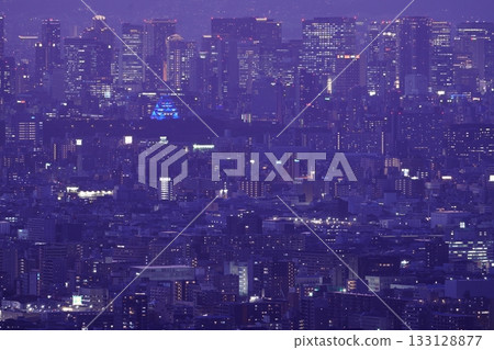 Osaka Castle lit up in blue, seen from above 133128877