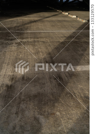 Parking lot and wheel chocks in the morning sun [Nagano Prefecture] 133129570